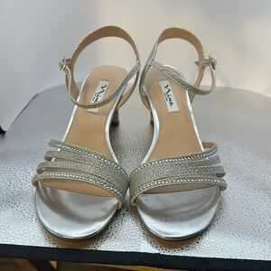 Nina of New York size 8 1/2. 3 inch heels, silver and silver sparkles.​​